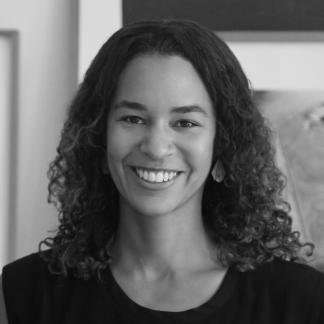 Black and white portrait of Catherine Hartley smiling